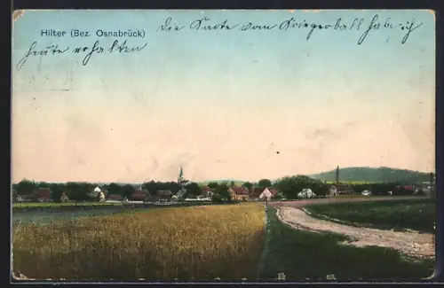 AK Hilter /Osnabrück, Ortsansicht mit Kirche und Feldern