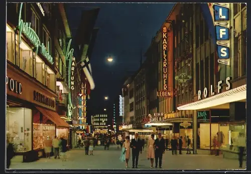 AK Kiel, Holstenstrasse bei Nacht, Leuchtreklamen, Passanten