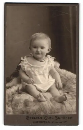 Fotografie Carl Schäfer, Elberfeld, Kipdorf 57, Porträt eines Kleinkindes 1911