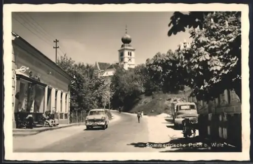 AK Puch b. Weiz, Strassenpartie mit Geschäft und Kirche