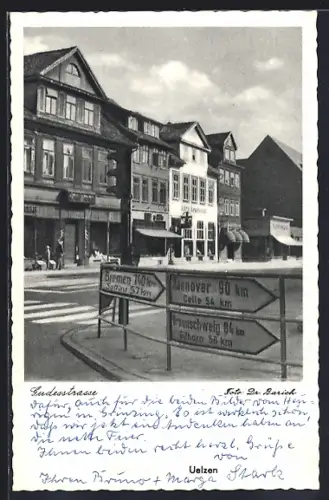 AK Uelzen, Gudesstrasse mit Geschäften
