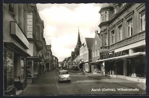 AK Aurich / Ostfriesland, Wilhelmstrasse mit Geschäften