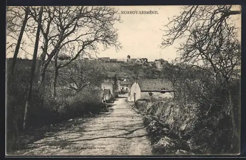 AK Norroy-Lesménil, Vue du village depuis le chemin bordé d`arbres en hiver