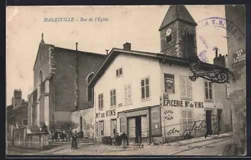 AK Malzéville, Rue de l`Église avec épicerie et clocher