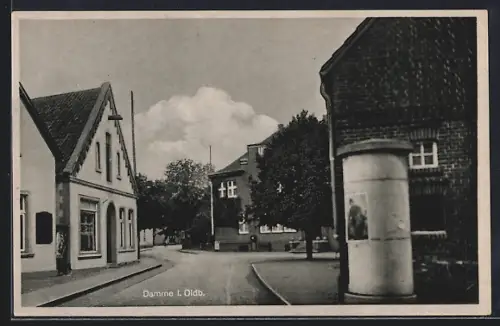 AK Damme i. Oldb., Strassenszene mit Litfasssäule