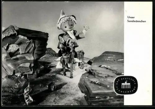 AK Sandmann auf einem Esel reitend