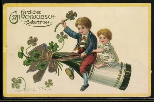 AK Kinder fliegen auf einer Weinflasche, Geburtstagsgruss, Kleeblätter