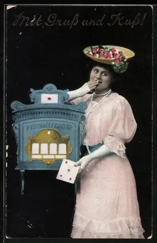 AK Frau wirft einen Brief in den Postkasten