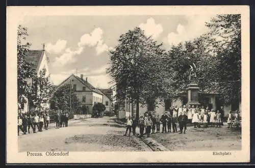 AK Preuss. Oldendorf, Strasse am Kirchplatz mit Denkmal