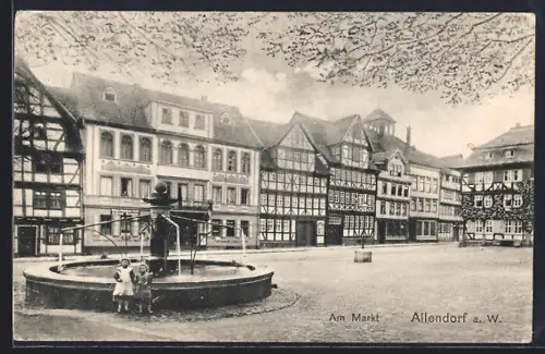 AK Allendorf a. W., Markt mit Geschäft und Brunnen