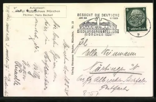 AK Münchner Kindl liegt lächelnd auf einem Tisch