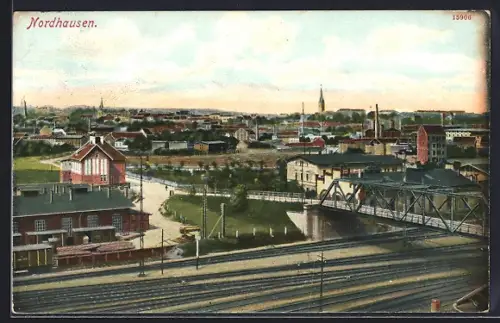 AK Nordhausen, Stadtansicht mit Bahnhof und Eisenbahnbrücke