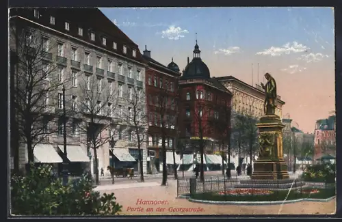 AK Hannover, Partie an der Georgstrasse mit Geschäften und Denkmal