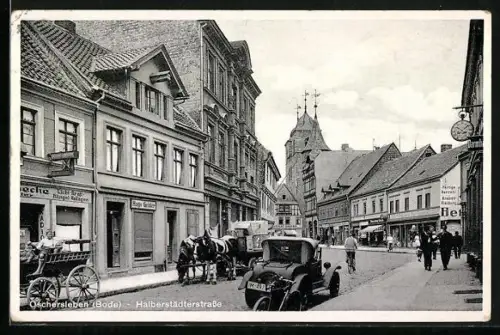 AK Oschersleben /Bode, Halberstädterstrasse mit Geschäft von Hugo Gehler
