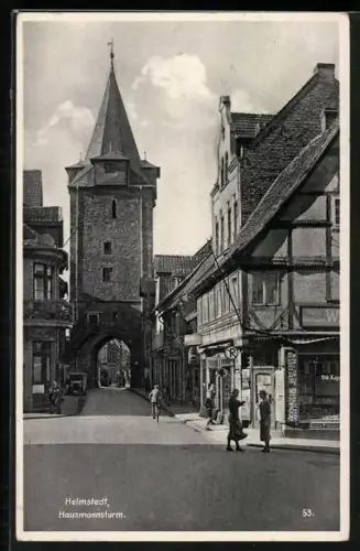 AK Helmstedt, Strassenpartie am Hausmannsturm mit Geschäften