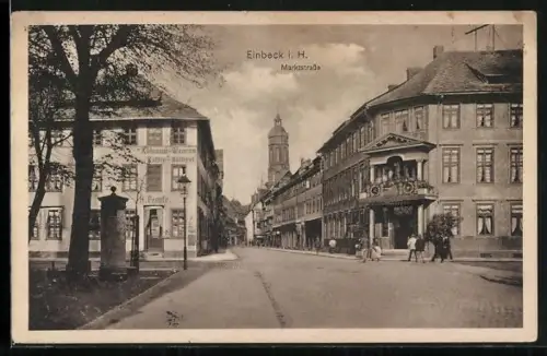 AK Einbeck i. H., Marktstrasse, Kreuzung mit Kolonialwaren Propfe, Litfasssäule, Turmgebäude