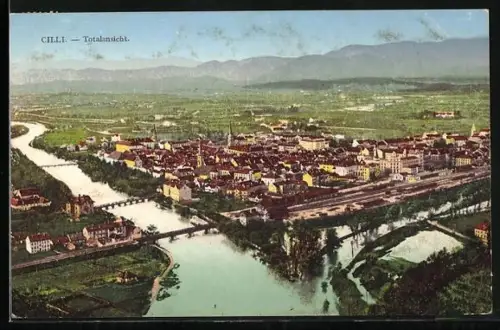 AK Cilli, Totalansicht mit Brücken und Bergpanorama aus der Vogelschau