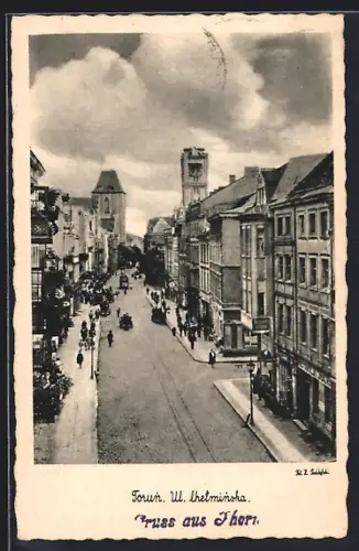 AK Thorn, Stadtleben mit Strassenbahn und Kirchturm