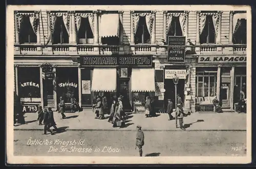 AK Libau, Die Gr. Strasse mit Apotheke