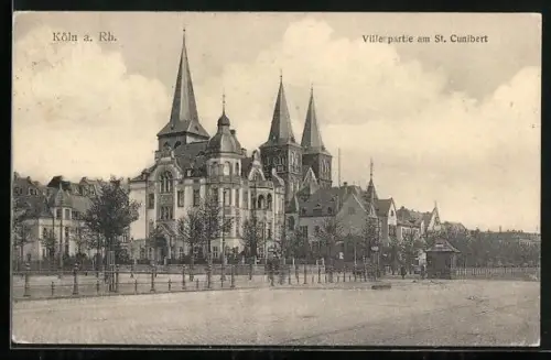 AK Köln a. Rh., Strassepartie an der St. Kunibert - Kirche
