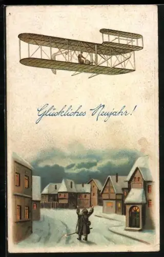 AK Neujahrsgrüsse, Flugzeug über der verschneiten Stadt