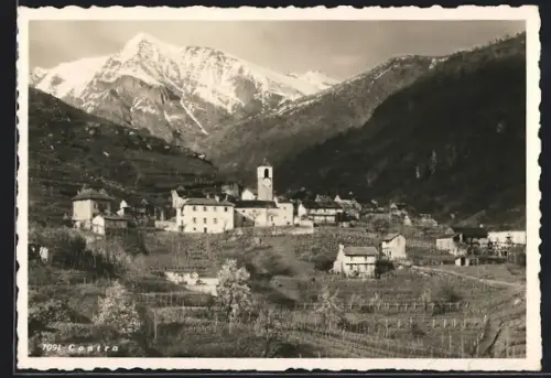 AK Contra, Ortspartie mit Kirche im Gebirge