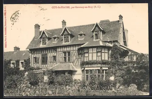 AK Cuy-St-Fiacre /Gournay-en-Bray, Maison à colombages entourée de verdure