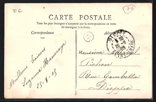 AK Angerville-la-Martel, Entrepôt A. Martel et église avec clôture en fer forgé