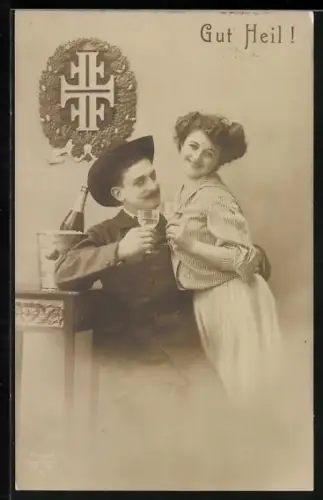 AK Paar stösst mit Sekt an, Gut Heil!, mit Turnerwappen