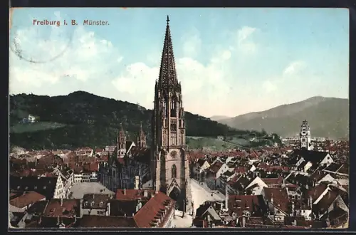 AK Freiburg i. B., Münster mit Strassenpartie