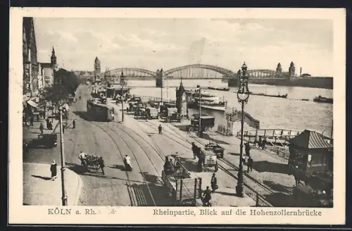 AK Köln a. Rh., Rheinpartie, Blick auf die Hohenzollernbrücke, Strassenbahn