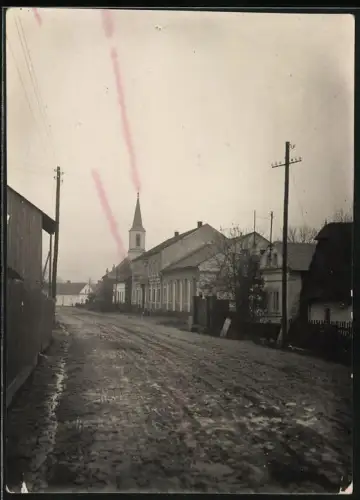 Fotografie Ansicht Lindow / Mark, Strassenpartie mit Blick zur Kirche