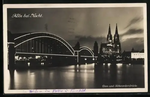 AK Köln, Dom und Hohenzollernbrücke bei Nacht