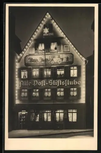 AK Stuttgart, Gasthaus Alte Post-Stiftsstube beleuchtet bei Nacht
