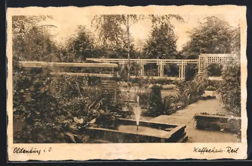 AK Oldenburg i. O., Cafe Reil, Garten mit Brunnen