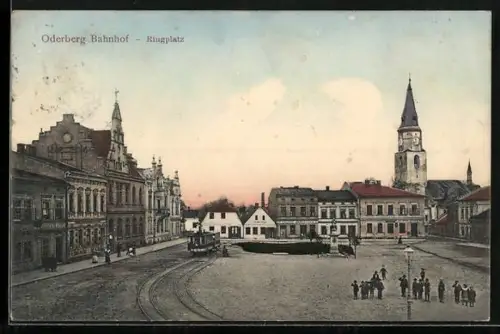 AK Oderberg Bahnhof, Ringplatz mit Geschäften, Kirche und Strassenbahn