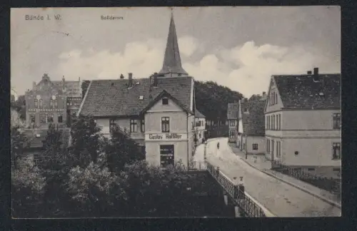 AK Bünde i. W., Strasse am Bolldamm, Geschäft Gustav Hotfilter, Kirche