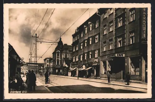 AK Oderberg /O. S., Grand-Hotel, Strassenpartie mit Geschäften