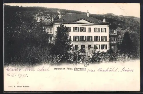 AK Neuveville, Institution Péter