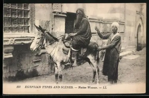 AK Verschleierte Frau sitzt auf einem Maultier