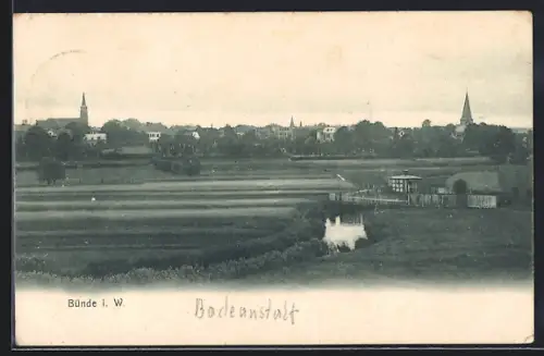 AK Bünde i. W., Badeanstalt, Stadtansicht mit Kirchen
