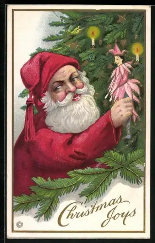 AK A Merry Christmas, Weihnachtsmann hält eine Puppe in der Hand