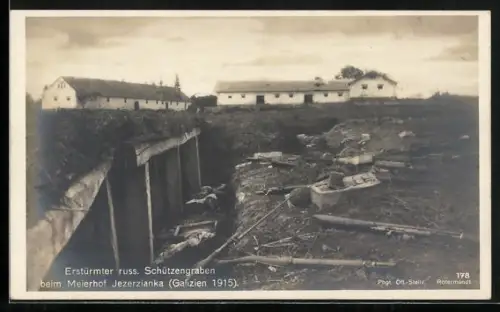 AK Jezerzianka /Galizien, Beim Meierhof, Erstürmter russischer Schützengraben und Gebäudepanorama, 1915