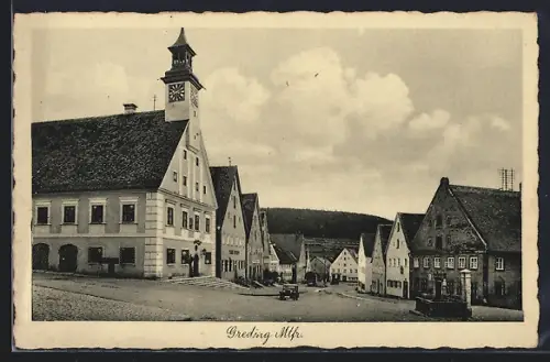 AK Greding /Mtfr., Strassenpartie mit Kirche und Brunnen
