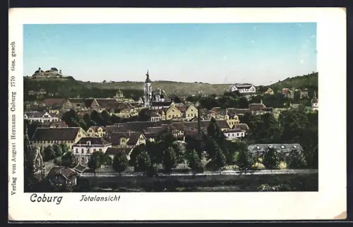 Goldfenster-AK Coburg, Totalansicht, Häuser mit leuchtenden Fenstern