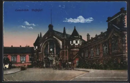 AK Osnabrück, Eingang zum Bahnhof mit Pferdekutschen