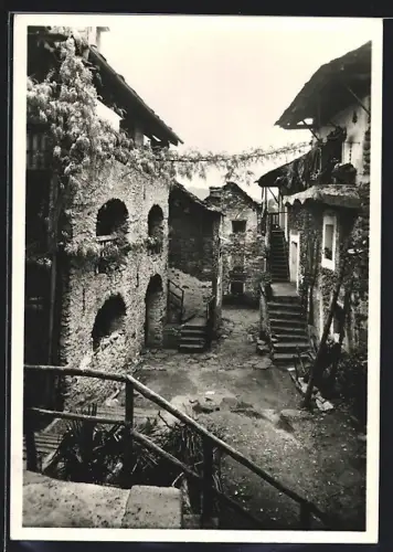 AK Arcegno, Motivo, Gasse mit Gebäude