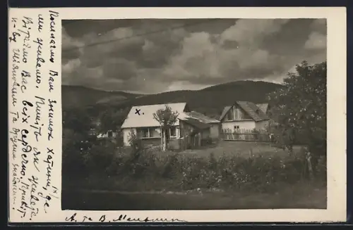 AK Huszt, Ortspartie mit Bergen