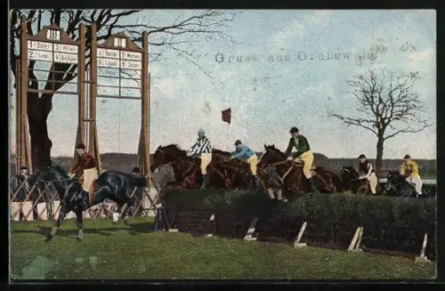 AK Jockeys überwinden eine Hürde beim Pferderennen