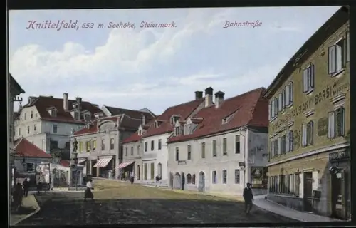 AK Knittelfeld, Bahnstrasse mit Passanten